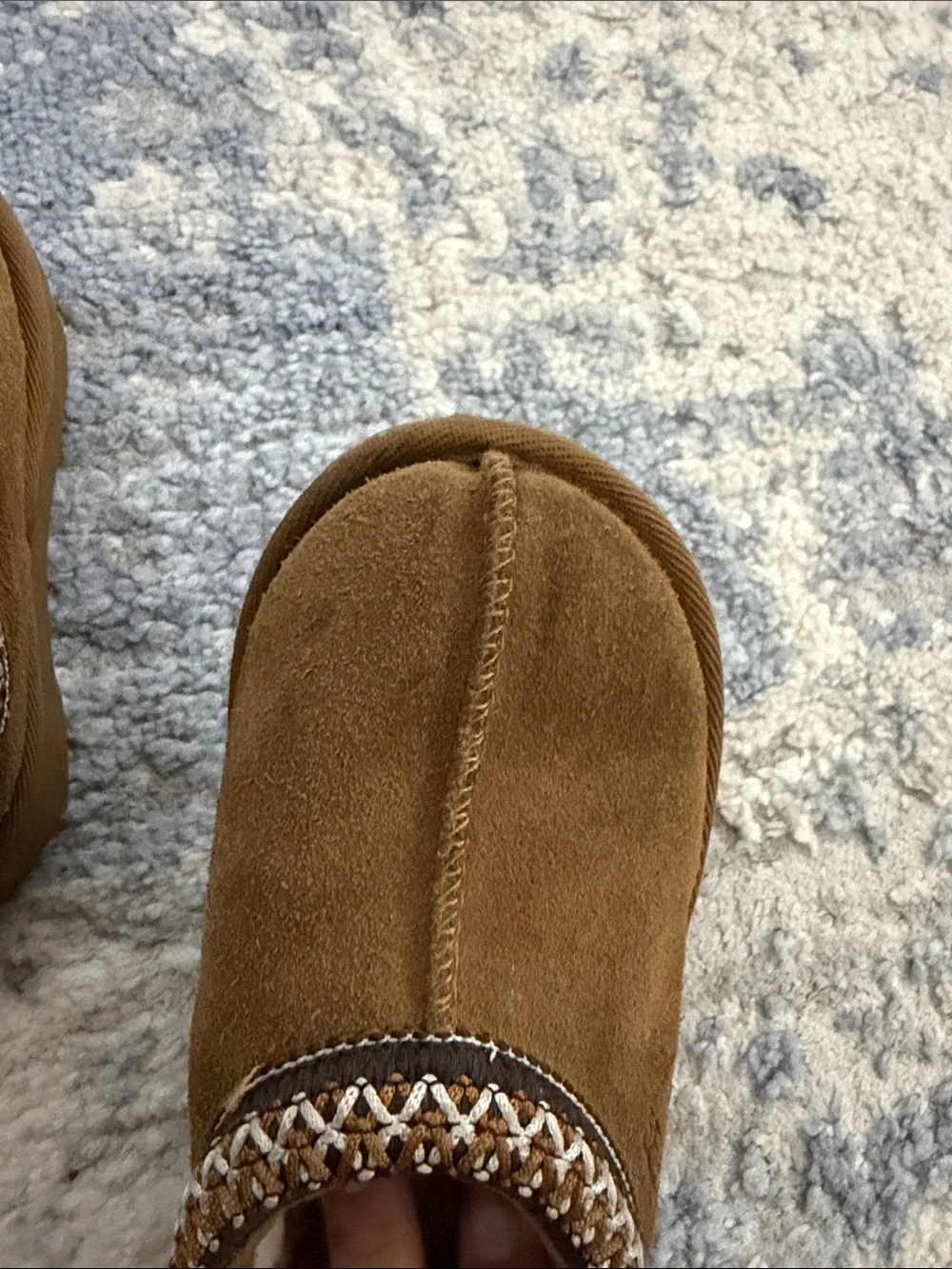 UGG toddler’s Chestnut Brown Faux-Suede Slip-On Slippers with Braided Trim